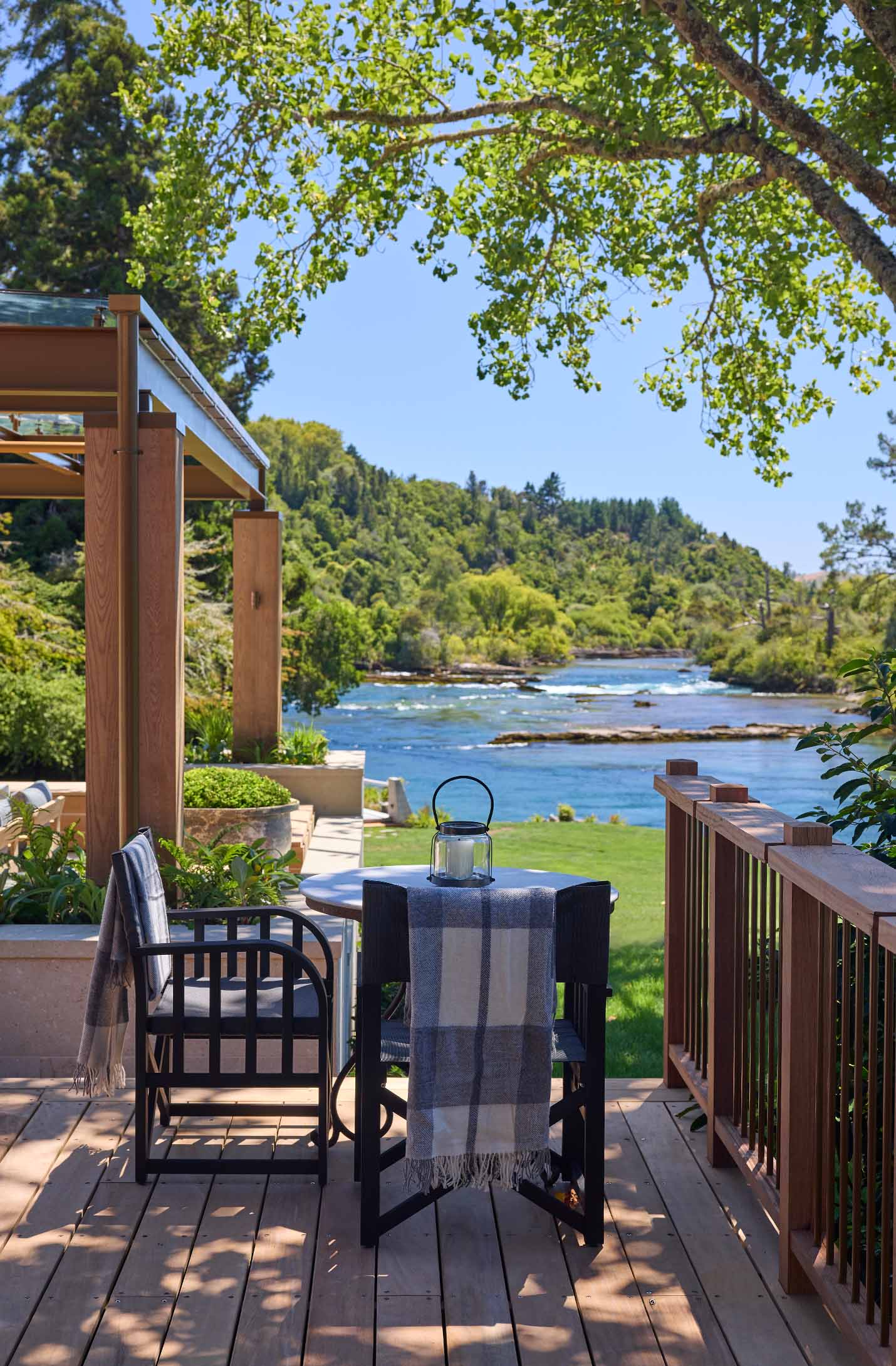 Huka Lodge’s terrace overlooking the Waikato River